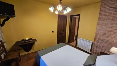 Cama o camas de una habitación en La Clerecia de Ledesma