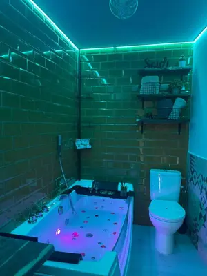 Un baño de U LAGARTU