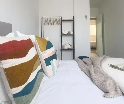 Cama o camas de una habitación en Apartamentos Gredos 202