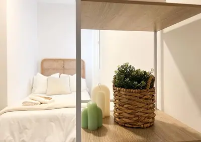 Cama o camas de una habitación en Apartamentos Gredos 202