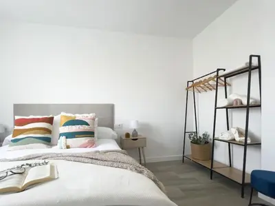 Cama o camas de una habitación en Apartamentos Gredos 202