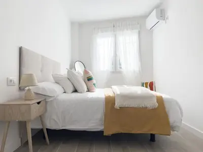 Cama o camas de una habitación en Apartamentos Gredos 201