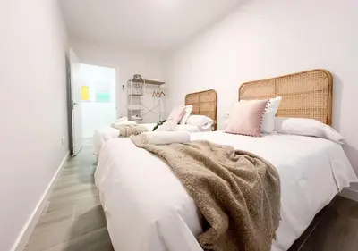 Cama o camas de una habitación en Apartamentos Gredos 201