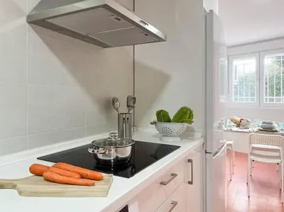 Una cocina o zona de cocina en Apartamentos Gredos 201