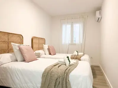 Cama o camas de una habitación en Apartamentos Gredos 201