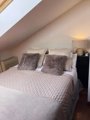Cama o camas de una habitación en Dúplex Sierpes centro parking opcional