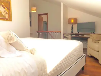 Cama o camas de una habitación en Dúplex Sierpes centro parking opcional