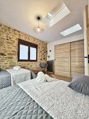 Cama o camas de una habitación en CASA RURAL U FORTI