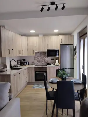 Una cocina o zona de cocina en CASA RURAL U FORTI