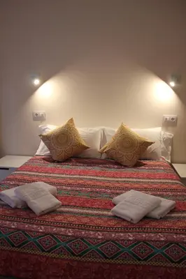 Cama o camas de una habitación en Encanto Celta, súper céntrico con parking incluido