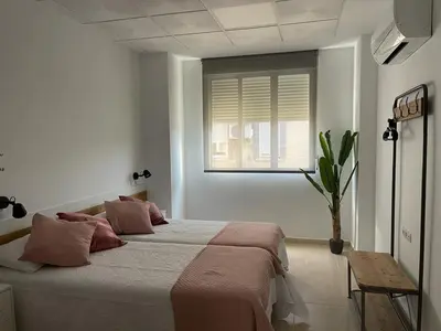 Cama o camas de una habitación en La Antigua Editorial