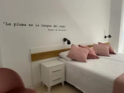 Cama o camas de una habitación en La Antigua Editorial