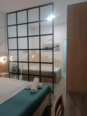 Cama o camas de una habitación en Apartamentos turisticos Avila Puerta de San Vicente 0-2
