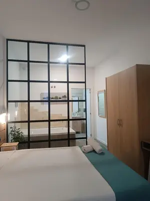 Cama o camas de una habitación en Apartamentos turisticos Avila Puerta de San Vicente 0-2