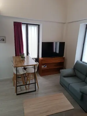 Una televisión o centro de entretenimiento en Apartamentos turisticos Ávila Puerta del Carmen 0-3