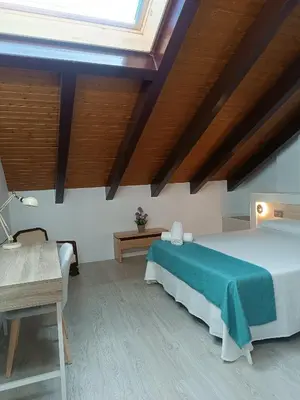 Cama o camas de una habitación en Apartamentos turisticos Ávila Puerta del Rastro 2-2