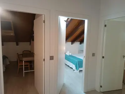 Cama o camas de una habitación en Apartamentos turisticos Ávila Puerta del Rastro 2-2