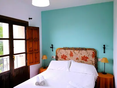Cama o camas de una habitación en Hotel rural El Jardin del Conde