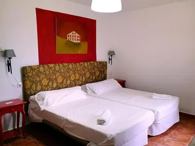 Cama o camas de una habitación en Hotel rural El Jardin del Conde