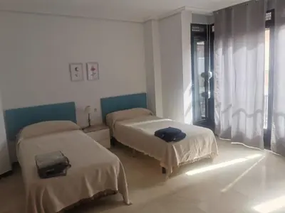 Cama o camas de una habitación en Mérida Monumental y Vacacional