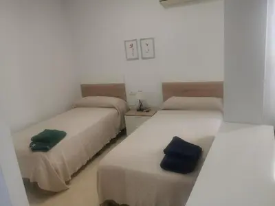 Cama o camas de una habitación en Mérida Monumental y Vacacional