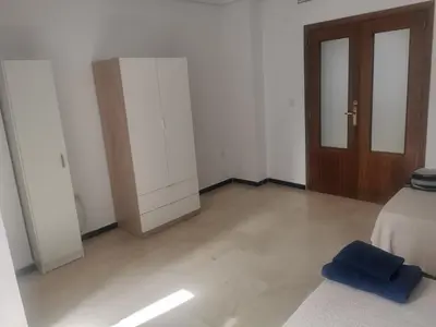 Cama o camas de una habitación en Mérida Monumental y Vacacional