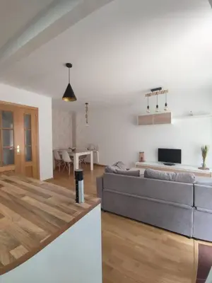 Una televisión o centro de entretenimiento en Casa Tatas Precioso piso recién reformado