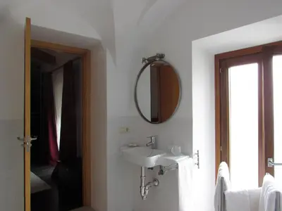 Un baño de Apartamentos La Machacona Plaza de Santiago