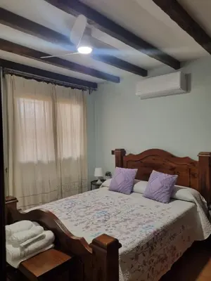 Cama o camas de una habitación en Casa de ensueño