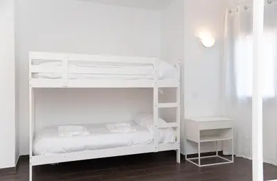 Cama o camas de una habitación en Hostería La milla Rural