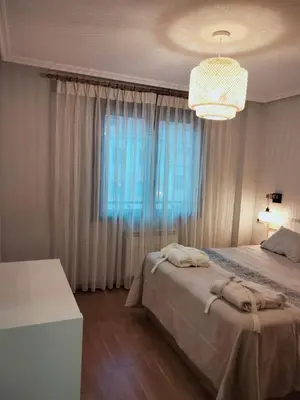 Cama o camas de una habitación en Bonito Piso completo