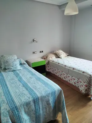 Cama o camas de una habitación en Bonito Piso completo