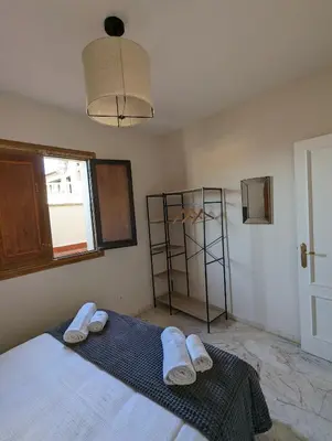 Cama o camas de una habitación en Ático San Juan 2