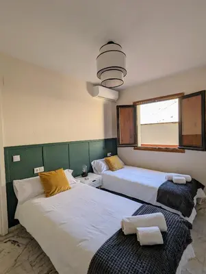 Cama o camas de una habitación en Ático San Juan 2
