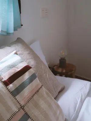Cama o camas de una habitación en La Fortaleza Apartamentos Rurales