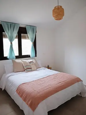 Cama o camas de una habitación en La Fortaleza Apartamentos Rurales