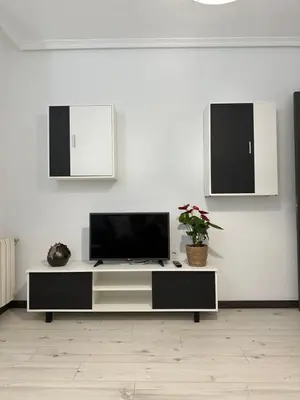 Una televisión o centro de entretenimiento en Villa Sol