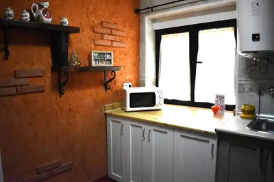 Una cocina o zona de cocina en Casa rural Los Barreros