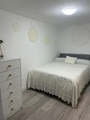 Cama o camas de una habitación en LA GOLONDRINA