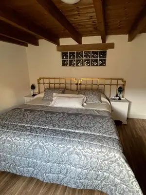 Cama o camas de una habitación en LA GOLONDRINA