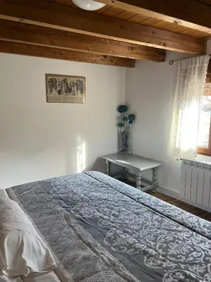 Cama o camas de una habitación en LA GOLONDRINA