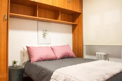 Cama o camas de una habitación en Residencial Leyra, Piso céntrico de 6 habitaciones, 8 camas