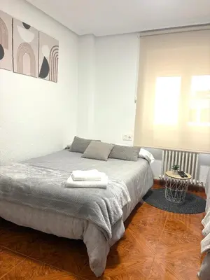 Cama o camas de una habitación en Residencial Leyra, Piso céntrico de 6 habitaciones, 8 camas