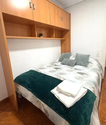 Cama o camas de una habitación en Residencial Leyra, Piso céntrico de 6 habitaciones, 8 camas
