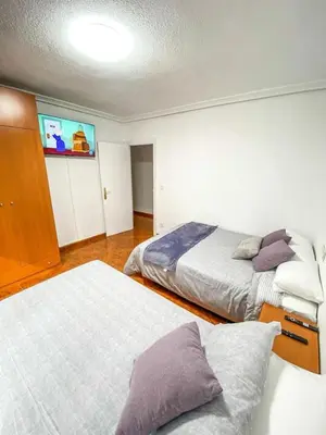 Cama o camas de una habitación en Residencial Leyra, Piso céntrico de 6 habitaciones, 8 camas