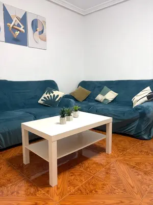Zona de estar de Residencial Leyra, Piso céntrico de 6 habitaciones, 8 camas