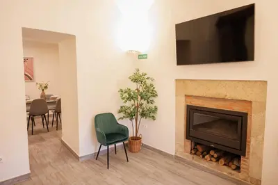 Una televisión o centro de entretenimiento en Apartamento Cuzco