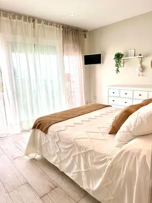 Cama o camas de una habitación en CASA RURAL AREV
