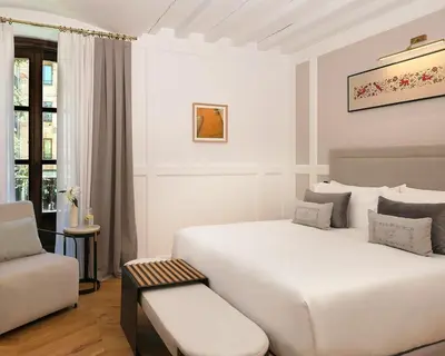 Cama o camas de una habitación en Eunice Hotel Gastronómico