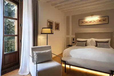 Cama o camas de una habitación en Eunice Hotel Gastronómico